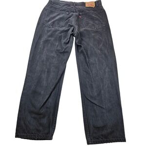 Vintage 99' Levis relaxed fit straight leg 38x30 black wash 553 BLANK TAB RARE -